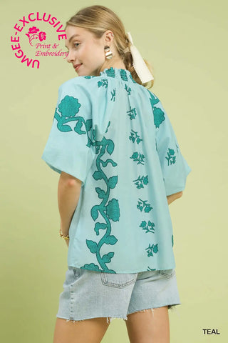 The Aria Smocked Stand Collar Puff Sleeve Embo Printed Top