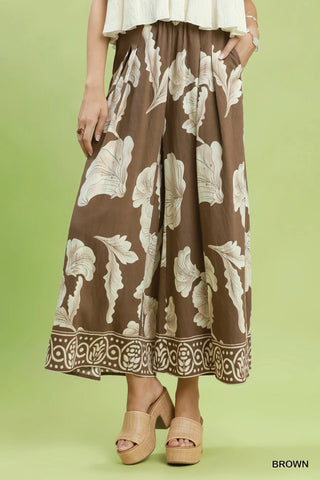 The Alessia Border Print Wide Leg Pull On Skirt Pants with Pockets