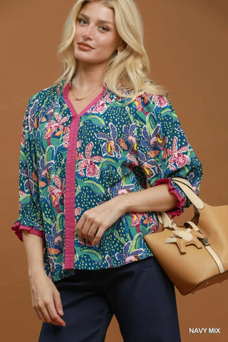 The Amy Abstract Print Ruffled Neck Top with Solid Contrast Detail