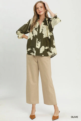 The Sophia Floral Split Neck Blouse with Ruffle Puff Sleeves