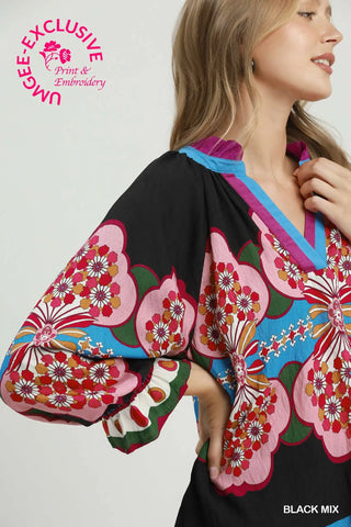 The Bianca Printed V-Neck Top with Color Blocked Placket