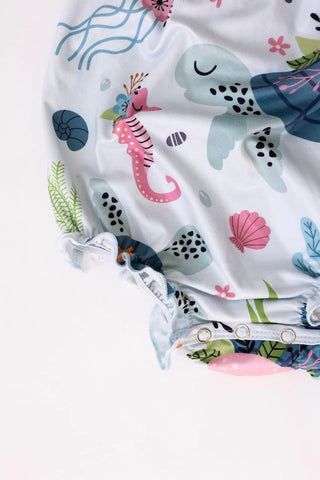 Beachy Keen Ruffle Cross Back Romper